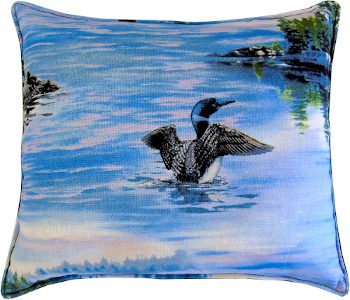 A pillow with a design of a loon swimming in water