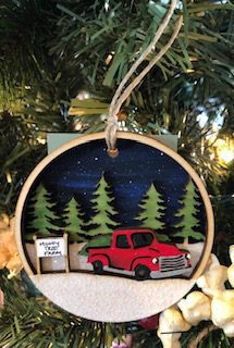 An ornament with a red car