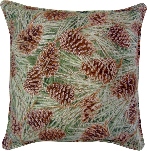 A pillow with a pine cone design