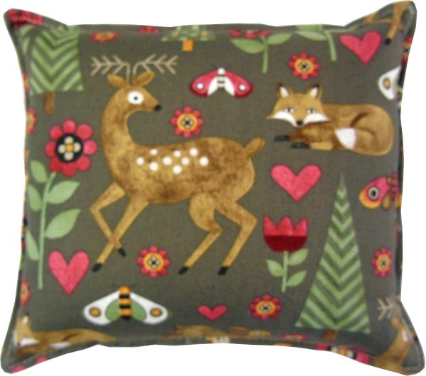Pillow with a deer and fox design