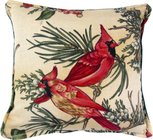 A pillow with a cardinal design