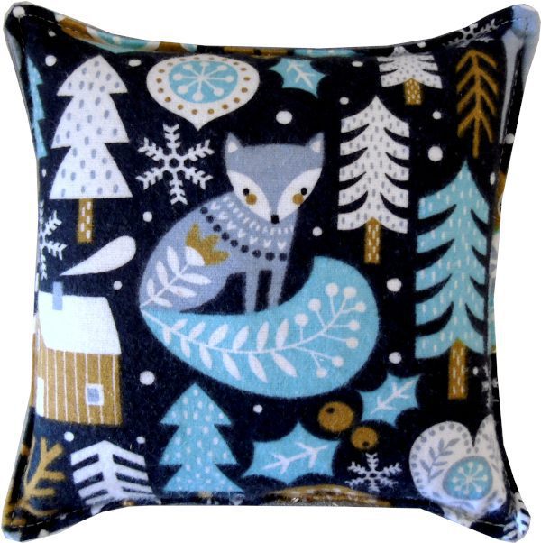 A throw pillow with whimsical woodland animals